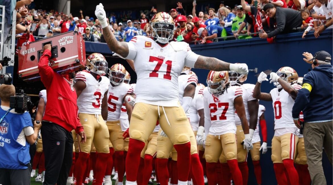 Sep 7, 2025; Seattle, Washington, USA; San Francisco 49ers offensive tackle Trent Williams (71) dances outside the locker room before player introductions against the Seattle Seahawks at Lumen Field. (Joe Nicholson-Imagn Images)