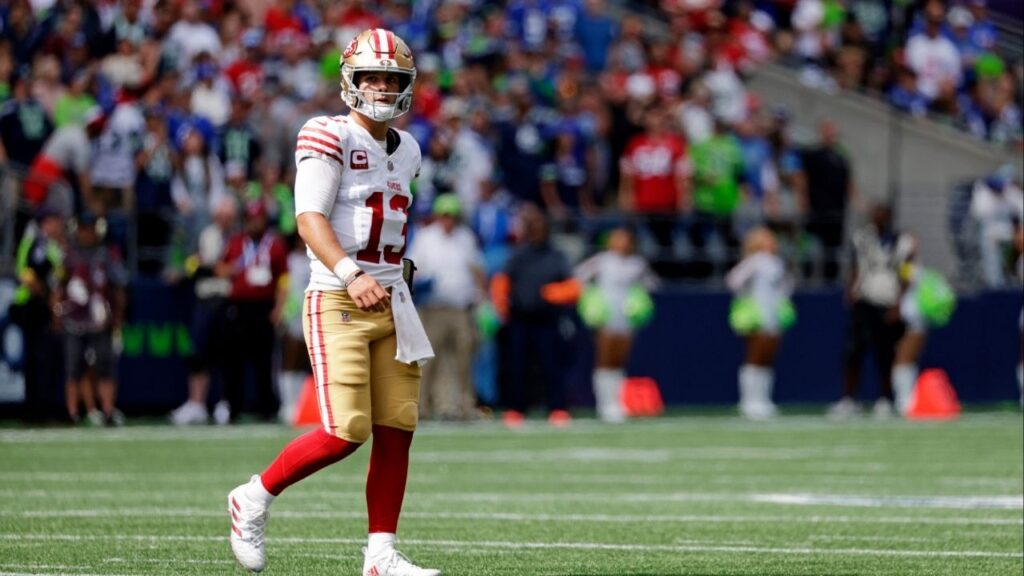 Sep 7, 2025; Seattle, Washington, USA; San Francisco 49ers quarterback Brock Purdy (13) looks on during the first half against the Seattle Seahawks at Lumen Field. (Joe Nicholson-Imagn Images)