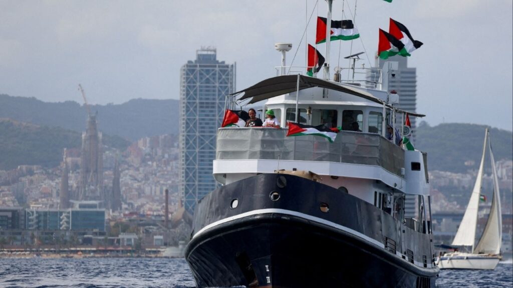 Swedish activist Greta Thunberg departs with other activists on the Global Sumud Flotilla, a humanitarian expedition to Gaza, from the port of Barcelona, Spain August 31, 2025. The Sagrada Familia is seen in the background. (Reuters File)