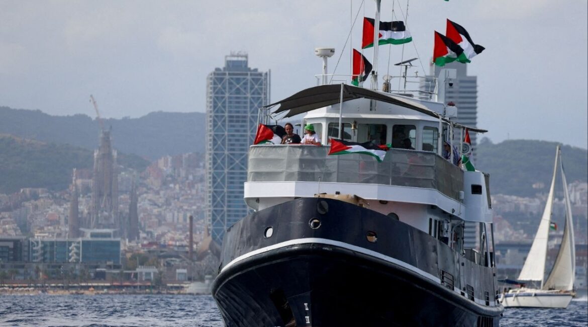 Swedish activist Greta Thunberg departs with other activists on the Global Sumud Flotilla, a humanitarian expedition to Gaza, from the port of Barcelona, Spain August 31, 2025. The Sagrada Familia is seen in the background. (Reuters File)