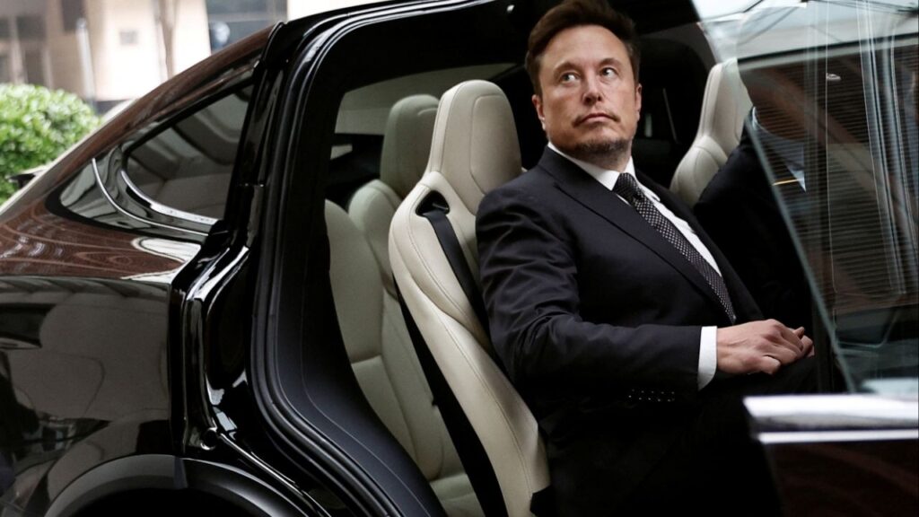 Tesla Chief Executive Officer Elon Musk gets in a Tesla car as he leaves a hotel in Beijing, China May 31, 2023. (Reuters File)