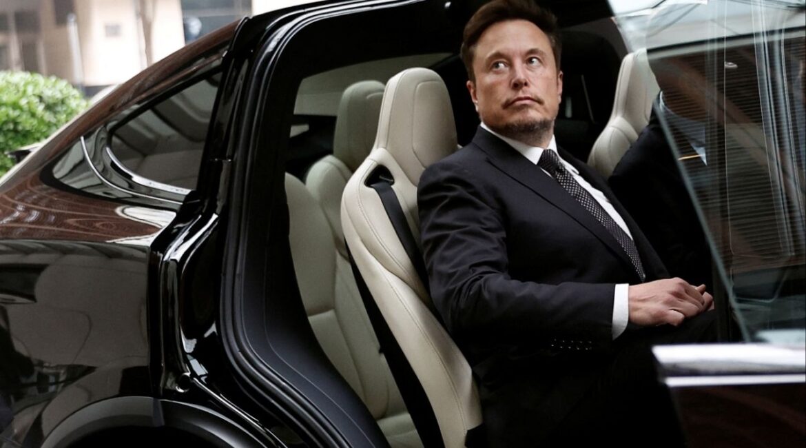 Tesla Chief Executive Officer Elon Musk gets in a Tesla car as he leaves a hotel in Beijing, China May 31, 2023. (Reuters File)