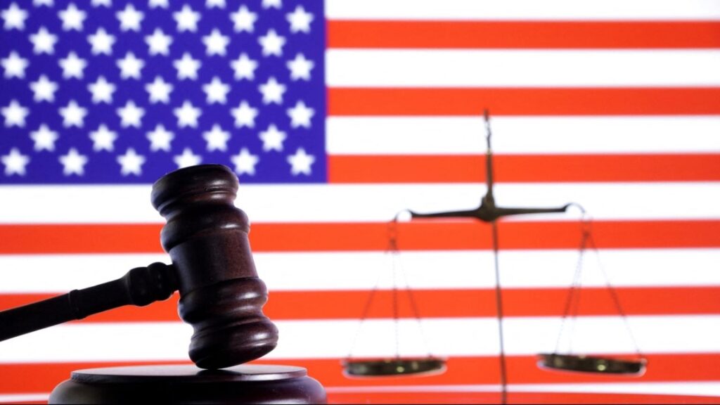 The U.S. flag, a judge gavel and a vintage scale are seen in this illustration taken August 6, 2024. (Reuters File)