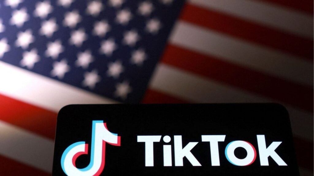 TikTok logo is placed on a U.S. flag in this illustration taken September 24, 2025. (Reuters File)