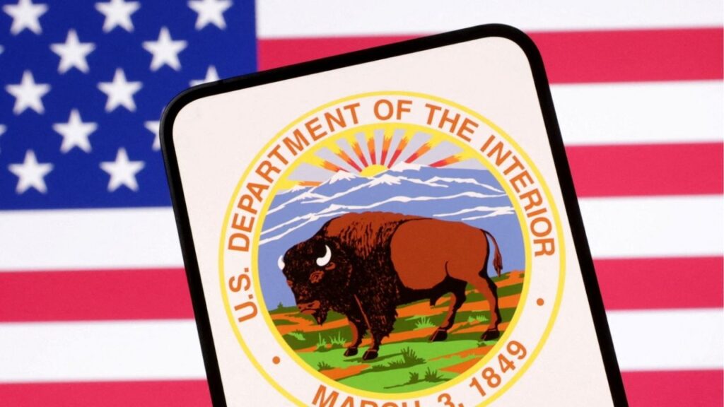 United States Department of the Interior logo and U.S. flag are seen in this illustration taken April 23, 2025. REUTERS/Dado Ruvic/Illustration