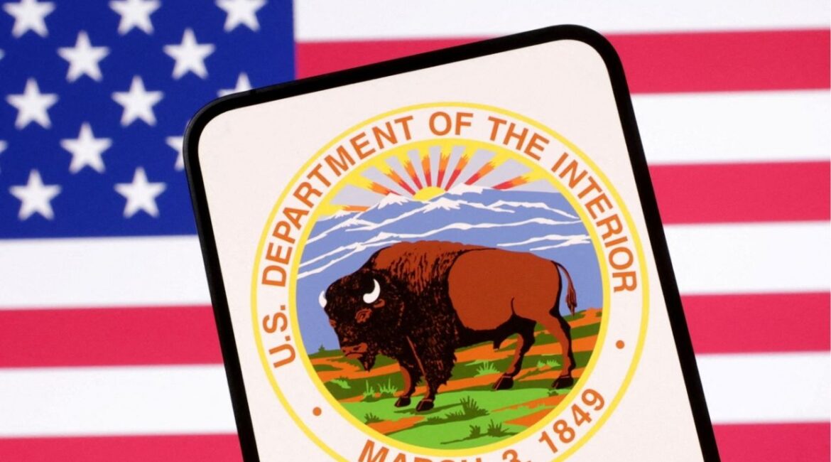 United States Department of the Interior logo and U.S. flag are seen in this illustration taken April 23, 2025. REUTERS/Dado Ruvic/Illustration