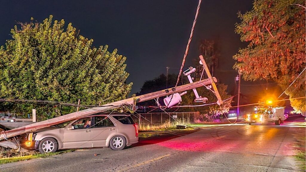 A Fresno driver, more than twice the legal alcohol limit, survived a crash into a power pole that left live wires across his car and the roadway. (CHP)