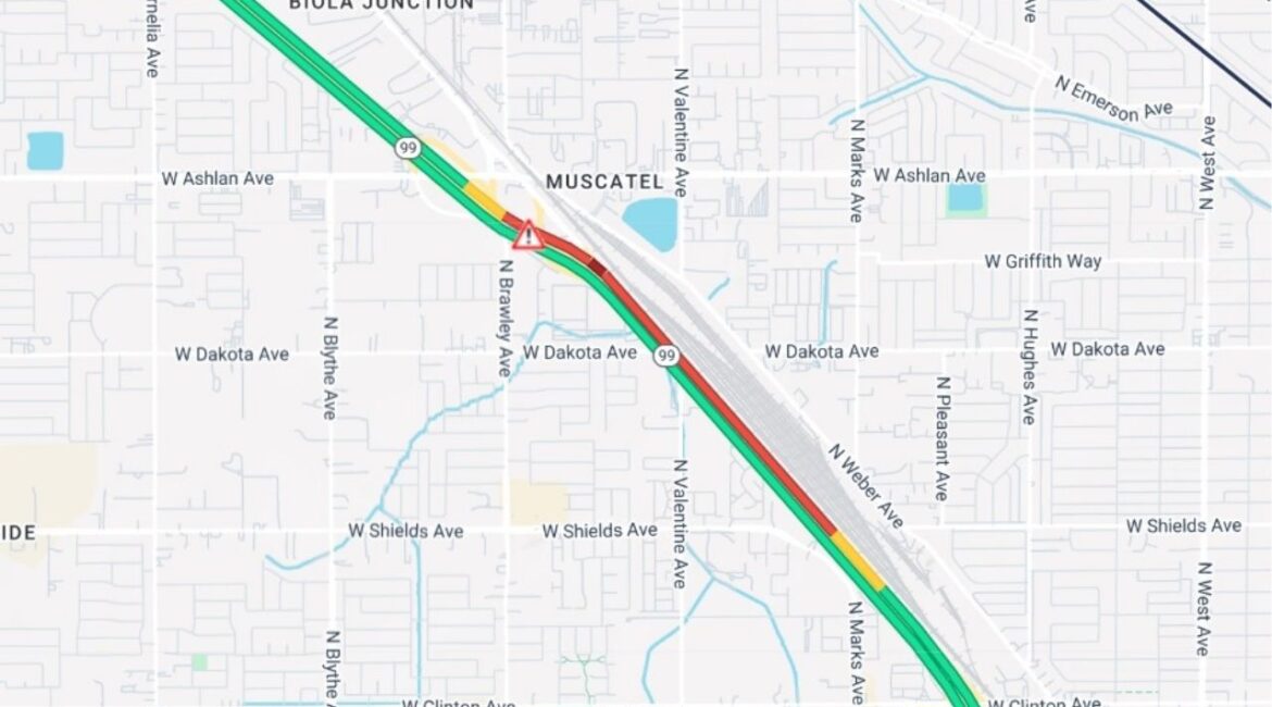 A refuse truck overturned Wednesday, Oct. 22, 2025, closing the northbound SR-99 offramp and No. 3 lane at Ashlan Avenue, with traffic backed up to Shields Avenue and no reopening time announced. (Caltrans)