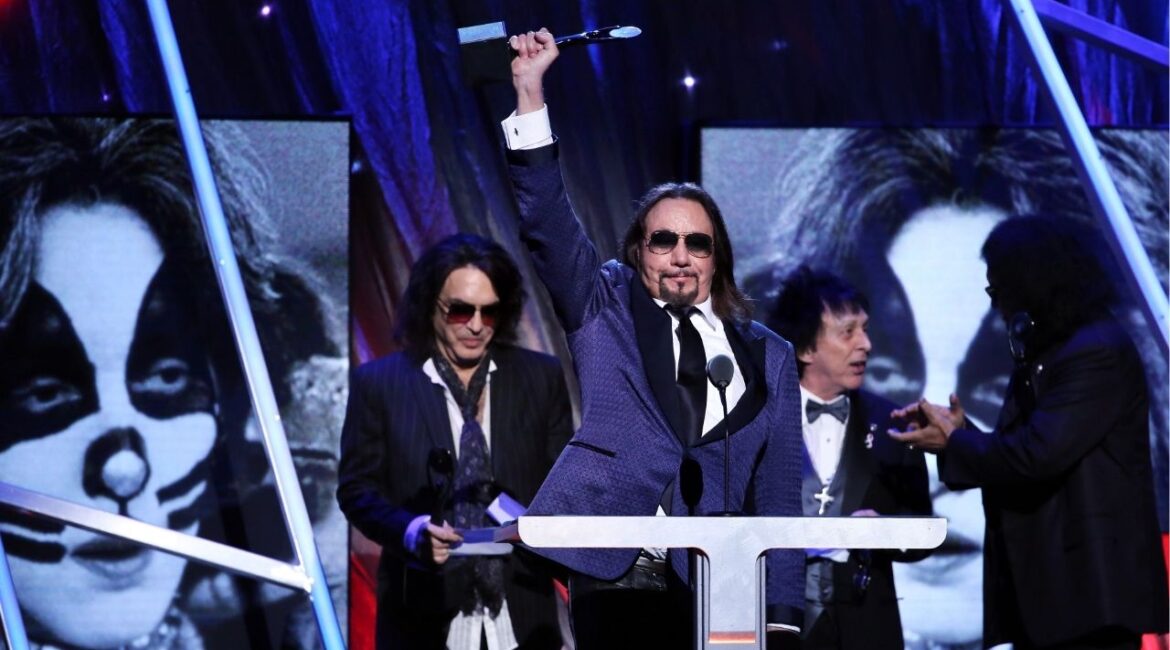 Ace Frehley, center, accepts an award with his Kiss bandmates during the 29th annual Rock & Roll Hall of Fame Induction Ceremony in New York, April 10, 2014. Frehley, the original lead guitarist of the band Kiss, who often performed in white-and-silver face makeup and sold millions of records during his two tenures with the band — from 1973 to 1982, and then from 1996 to 2002 — died on Thursday, Oct. 16, 2025, in Morristown, N.J. He was 74. (Richard Perry/The New York Times)