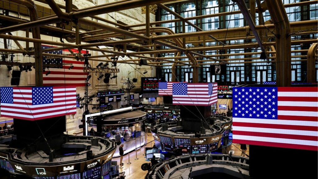 American flags are displayed on screens on the floor at the New York Stock Exchange (NYSE) in New York City, U.S., September 22, 2025. (Reuters File)