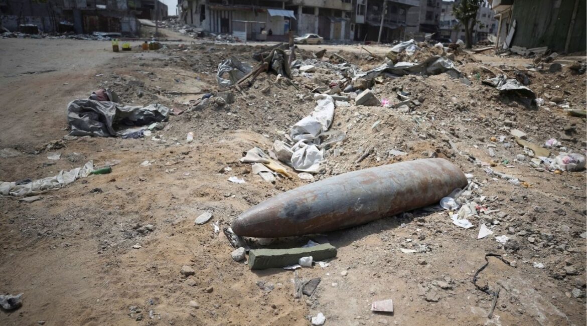 An unexploded missile fired by an Israeli aircraft lies among the rubble, amid the ongoing conflict between Israel and Hamas, in the northern Gaza Strip May 14, 2024. (Reuters/Dawoud Abu Alkas)