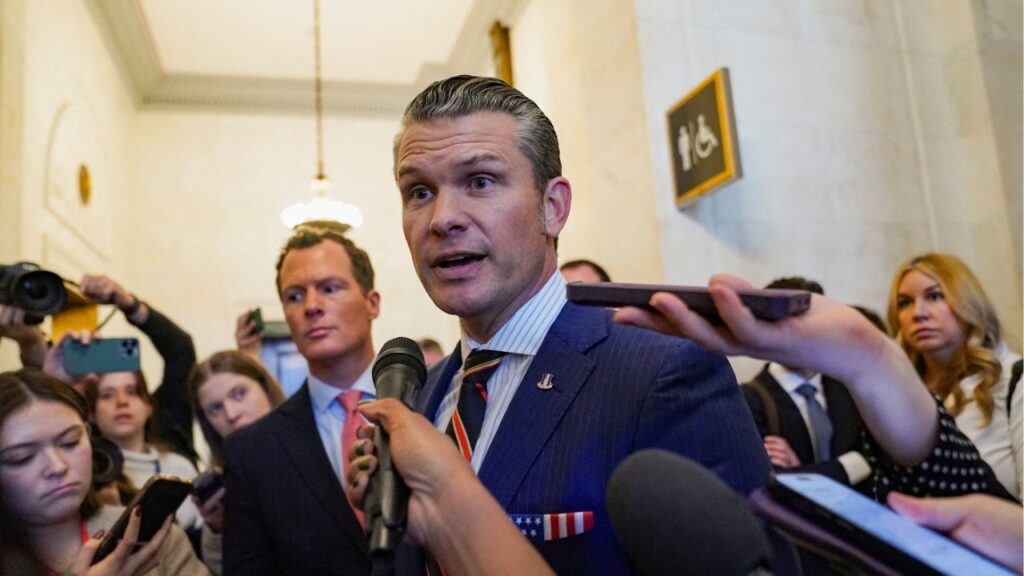 Defense secretary nominee Pete Hegseth speaks with the media as he departs a meeting on Capitol Hill in Washington, U.S., November 21, 2024. REUTERS/Nathan Howard
