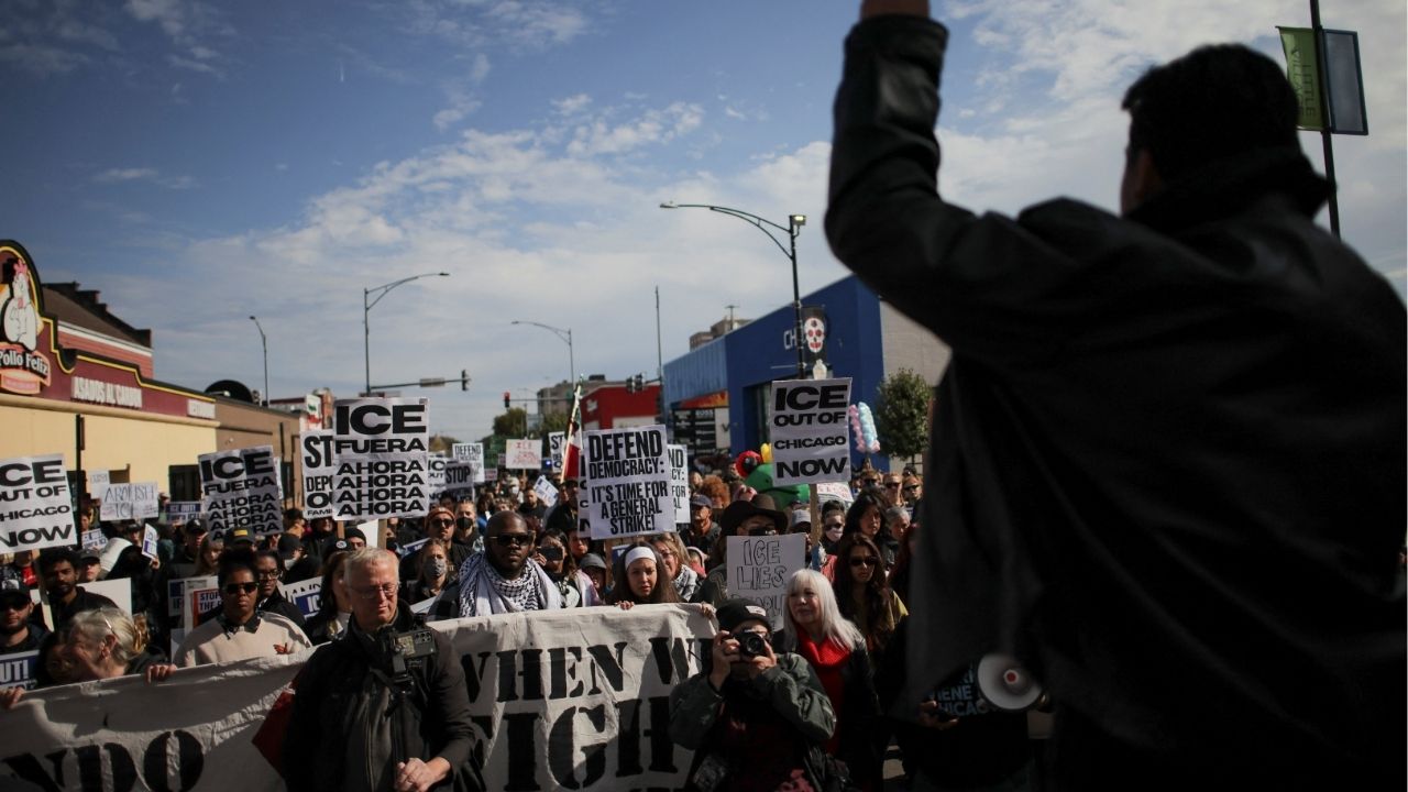 Demonstrators take part in a protest against ICE raids, in Little Village, Chicago, Illinois, U.S., October 24, 2025. (Reuters/Daniel Cole)