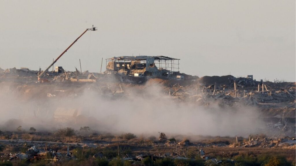 Destroyed buildings following explosions in Gaza, as seen from southern Israel, October 7, 2025. (Reuters/Ammar Awad)