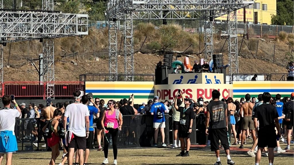 Dillon Francis, with the "Diplo Dinos," take the stage after the 5K on Sunday, Oct. 12, 2025. (GV Wire)