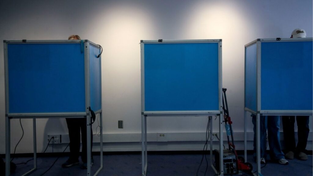 Early voters fill out their ballots at the Palm Springs Public Library in Palm Springs, Calif., Oct. 30, 2024. (USA Today Network via Reuters)
