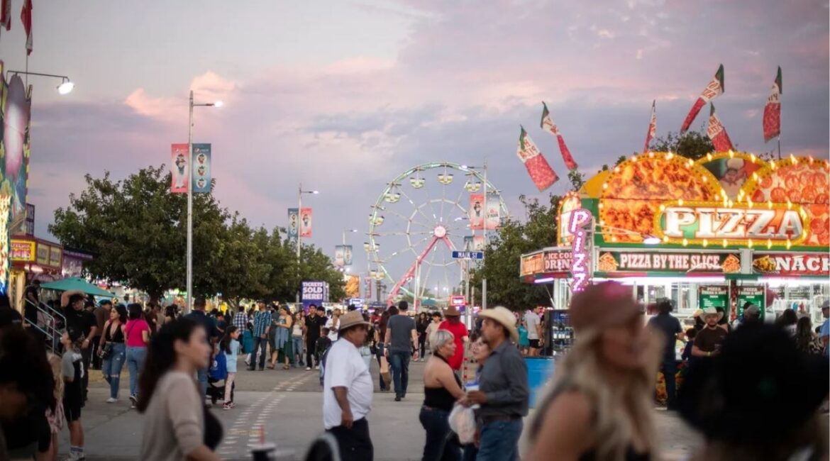 Fairgoers walks around the Kern County Fair in Bakersfield on Sept. 26, 2025. Photo by Larry Valenzuela, CalMatters/CatchLight Local