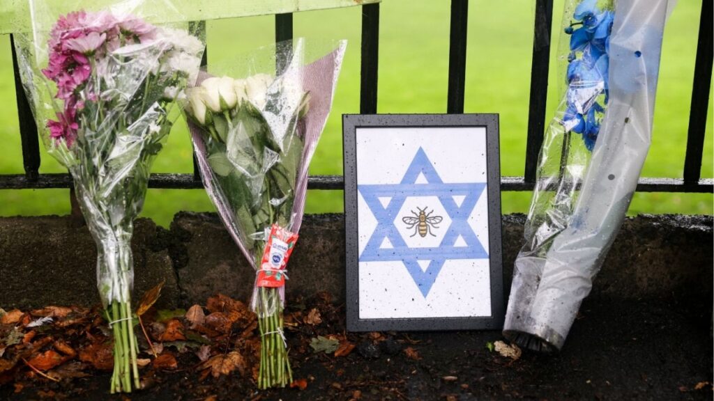 Flowers are left outside the Manchester synagogue, where multiple people were killed on Yom Kippur in what police have declared a terrorist incident, in north Manchester, Britain, October 3, 2025. (Reuters/Temilade Adelaja)