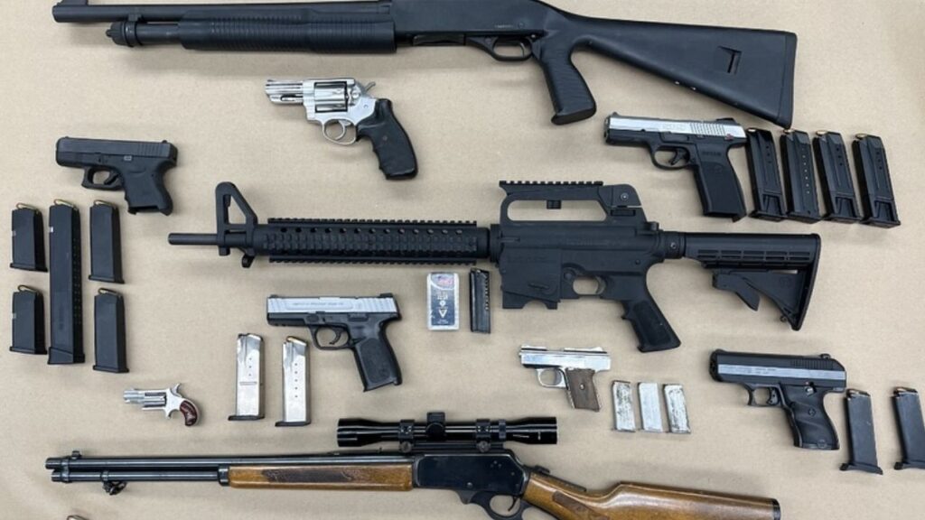 Fresno police arrested a convicted felon in Southeast Fresno after seizing 10 guns, ballistic vests, ammunition, and narcotics during a search. (Fresno PD)