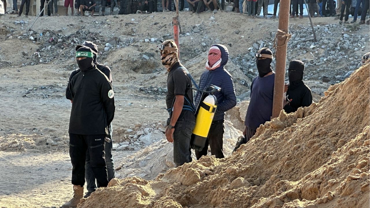 Hamas militants search for the bodies of deceased hostages, kidnapped by Hamas during the October 7, 2023, attack on Israel, amid a ceasefire between Israel and Hamas, in Khan Younis, southern Gaza Strip, October 28, 2025. (Reuters/Haseeb Alwazeer)