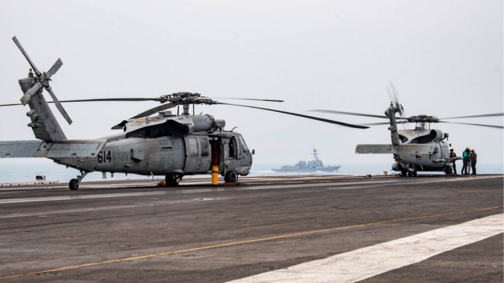 In a photo from the U.S. Navy, a MH-60R Sea Hawk on the flight deck of the U.S.S. Ronald Reagan in the South China Sea, July 9, 2020. The same model of helicopter went down in the sea on Sunday, Oct. 26, 2025. The crew was rescued. (Mass Communication (Specialist 3rd Class Erica Bechard/U.S. Navy via The New York Times)