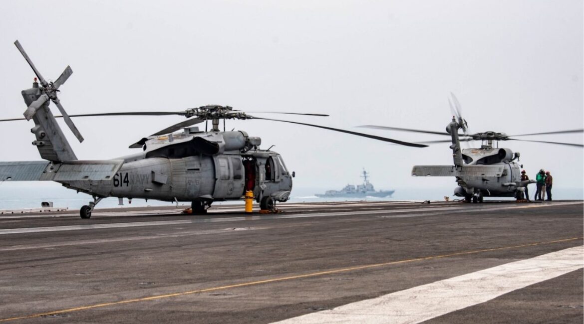 In a photo from the U.S. Navy, a MH-60R Sea Hawk on the flight deck of the U.S.S. Ronald Reagan in the South China Sea, July 9, 2020. The same model of helicopter went down in the sea on Sunday, Oct. 26, 2025. The crew was rescued. (Mass Communication (Specialist 3rd Class Erica Bechard/U.S. Navy via The New York Times)