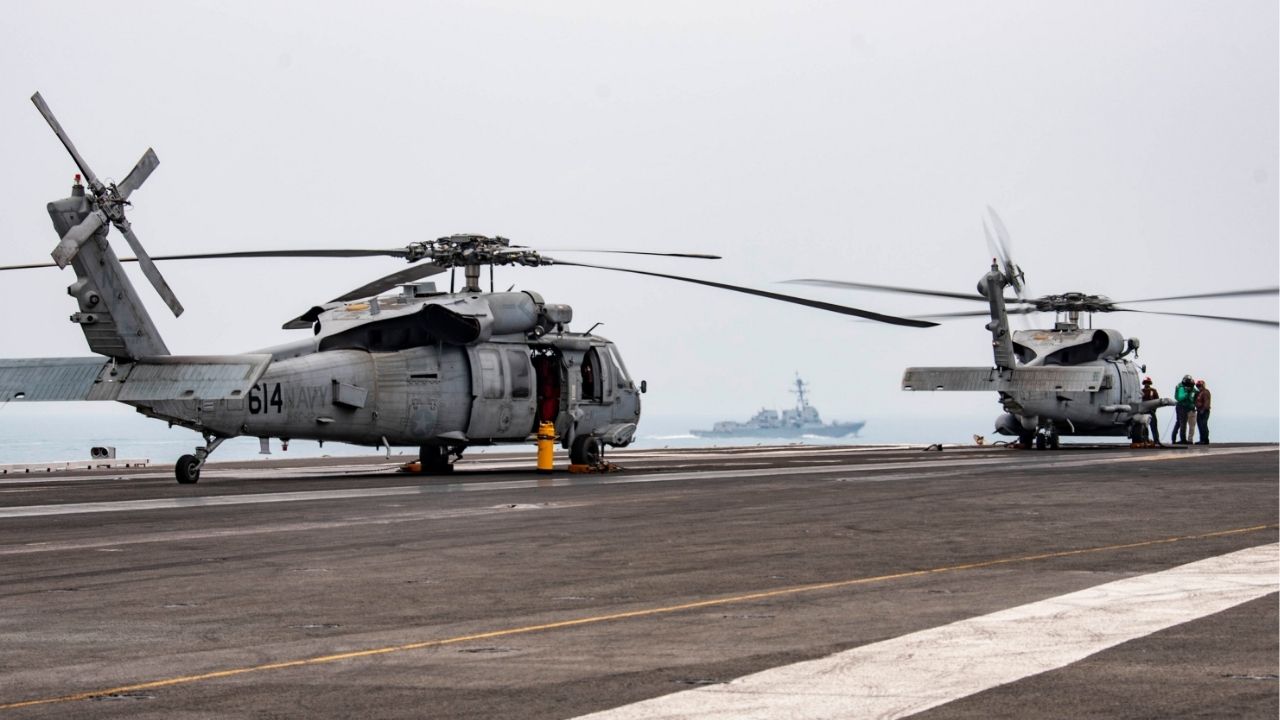 In a photo from the U.S. Navy, a MH-60R Sea Hawk on the flight deck of the U.S.S. Ronald Reagan in the South China Sea, July 9, 2020. The same model of helicopter went down in the sea on Sunday, Oct. 26, 2025. The crew was rescued. (Mass Communication (Specialist 3rd Class Erica Bechard/U.S. Navy via The New York Times)