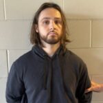 Jonathan Rinderknecht, 29, is posed after his arrest on charges that he intentionally ignited the Pacific Palisades Fire in Los Angeles, before his first court appearance in Orlando, Florida, U.S. October 8, 2025. Department of Justice/Handout via REUTERS

