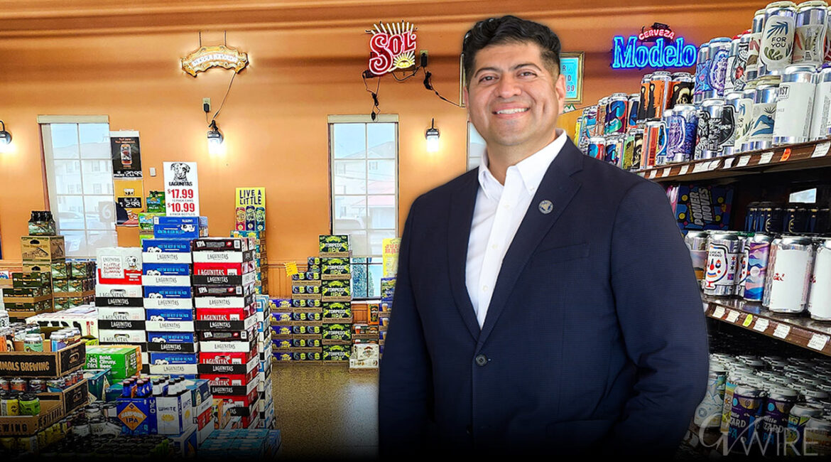 Luis Chavez standing in a liquor store