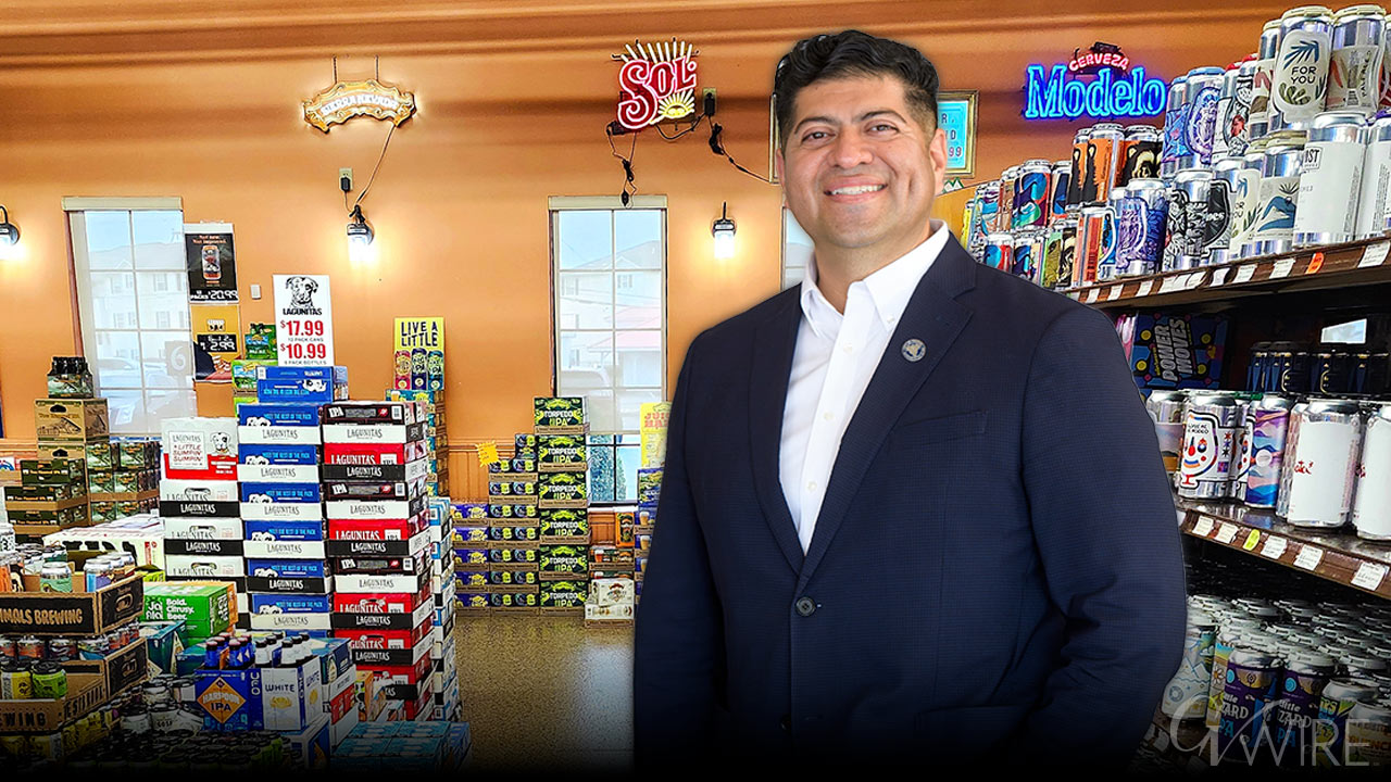 Luis Chavez standing in a liquor store