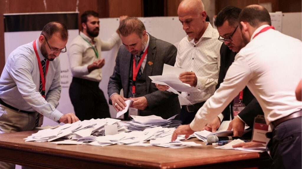 Members of electoral colleges count votes, on the day they vote for candidates of the new Syrian Parliament since Bashar al-Assad's government was toppled, in Aleppo, Syria, October 5, 2025. (Reuters/Mahmoud Hassano)