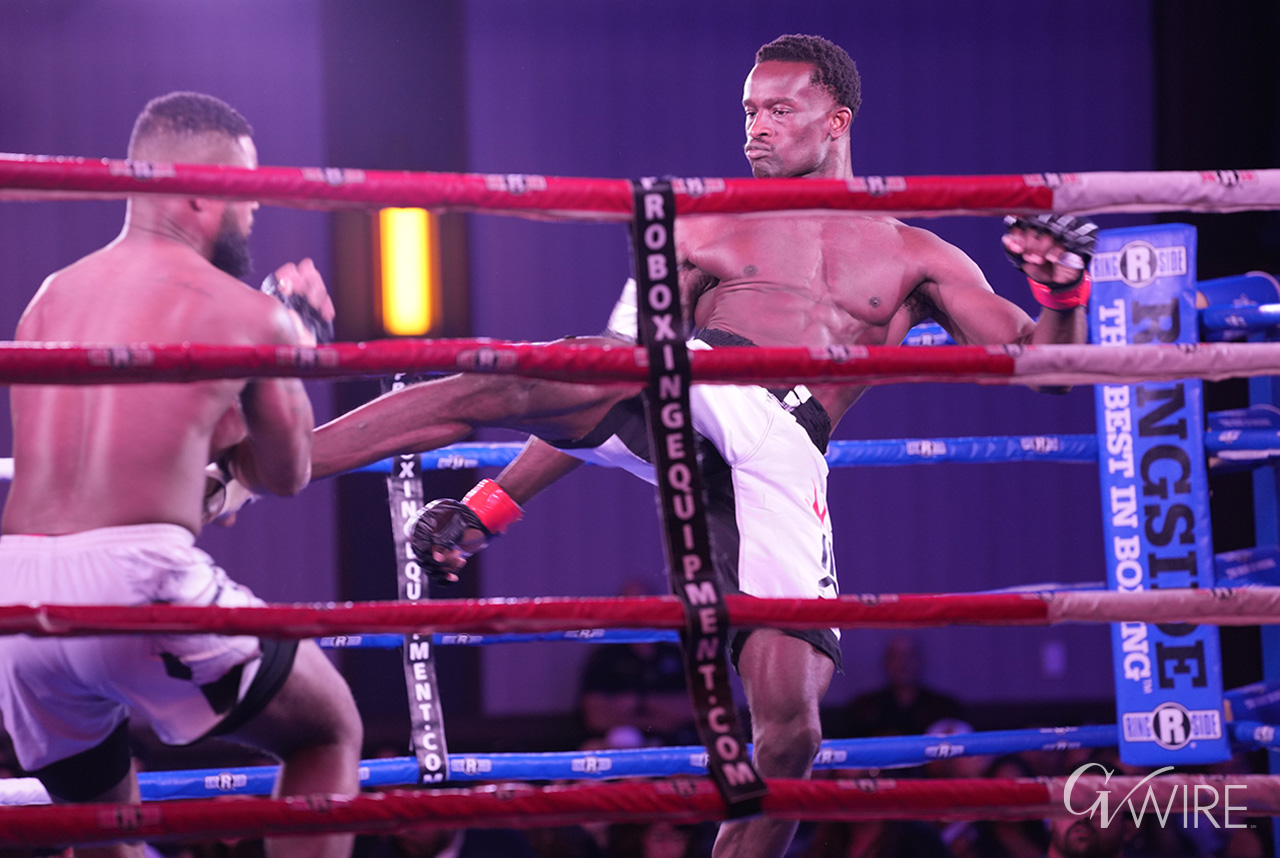 Oseyiomon Oyemhonlan out of Antioch lands a body kick against Marlon Watkins of Fresno in their 170-pound mixed martial arts bout on Saturday, Sept. 25 2025. Oyemhonlan would win the fight after finishing a guillotine choke on Watkins in the first round.