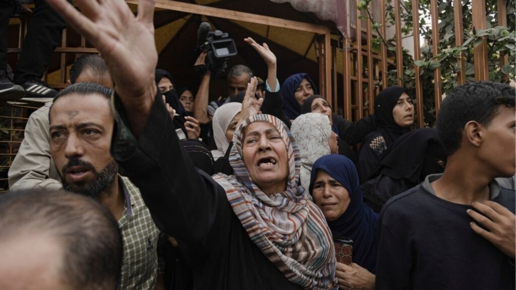 Palestinians bid farewell to their loved ones inside the Nasser Medical Complex in Khan Younis, Gaza Strip on Wednesday, Oct. 29, 2025. Israeli strikes killed at least 100 people across Gaza overnight, health officials said. The Israeli government accused Hamas of violating the three-week-old truce by failing to return the bodies of dead hostages and attacking Israeli forces in Rafah, and declared a cease-fire had resumed at 10 a.m. local time. (Saher Alghorra/The New York Times)