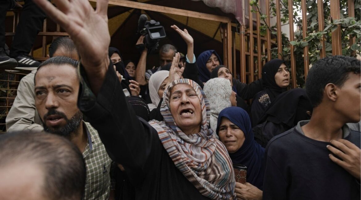 Palestinians bid farewell to their loved ones inside the Nasser Medical Complex in Khan Younis, Gaza Strip on Wednesday, Oct. 29, 2025. Israeli strikes killed at least 100 people across Gaza overnight, health officials said. The Israeli government accused Hamas of violating the three-week-old truce by failing to return the bodies of dead hostages and attacking Israeli forces in Rafah, and declared a cease-fire had resumed at 10 a.m. local time. (Saher Alghorra/The New York Times)