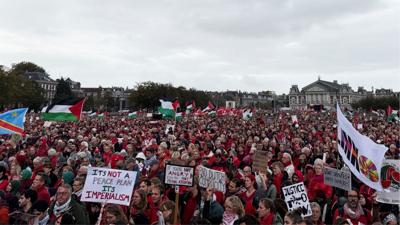 Pro-Palestinian protesters gather at Museumplein ahead of a 6 km march through the city as part of a protest demanding a tougher stance from the Dutch government against Israel's war in Gaza, in Amsterdam, Netherlands, October 5, 2025. (Reuters/Charlotte Van Campenhout)