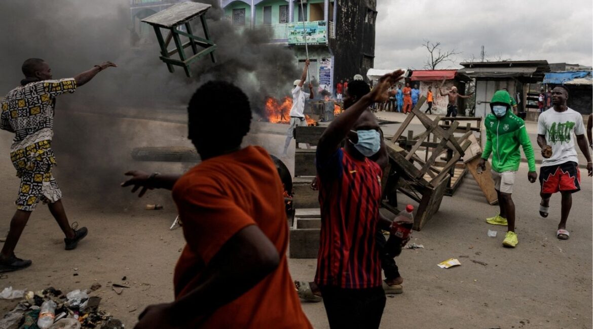 Supporters of the Cameroon opposition candidate Issa Tchiroma react as they clash with security forces during a protest after the Constitutional Council declared President Paul Biya the winner of the October 12 presidential election in Douala, Cameroon, October 27, 2025. (Reuters/Zohra Bensemra)
