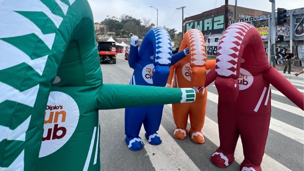 The "Diplo Dinos" waddle to the start line for the Diplo Run Club in Los Angeles on Sunday, Oct. 12, 2025. (GV Wire)