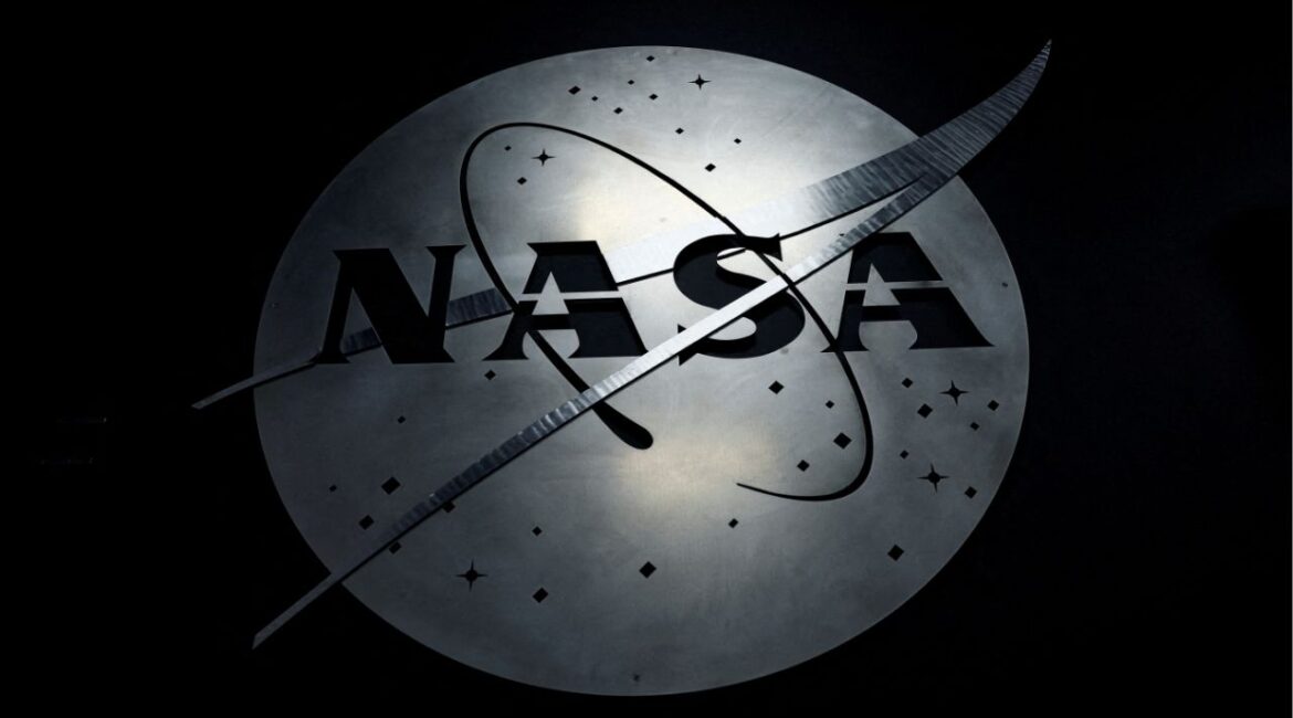The NASA logo hangs in the Mission Operations Control Center at Wallops Flight Facility on Wallops Island, Virginia, U.S., October 26, 2022. (Reuters File)