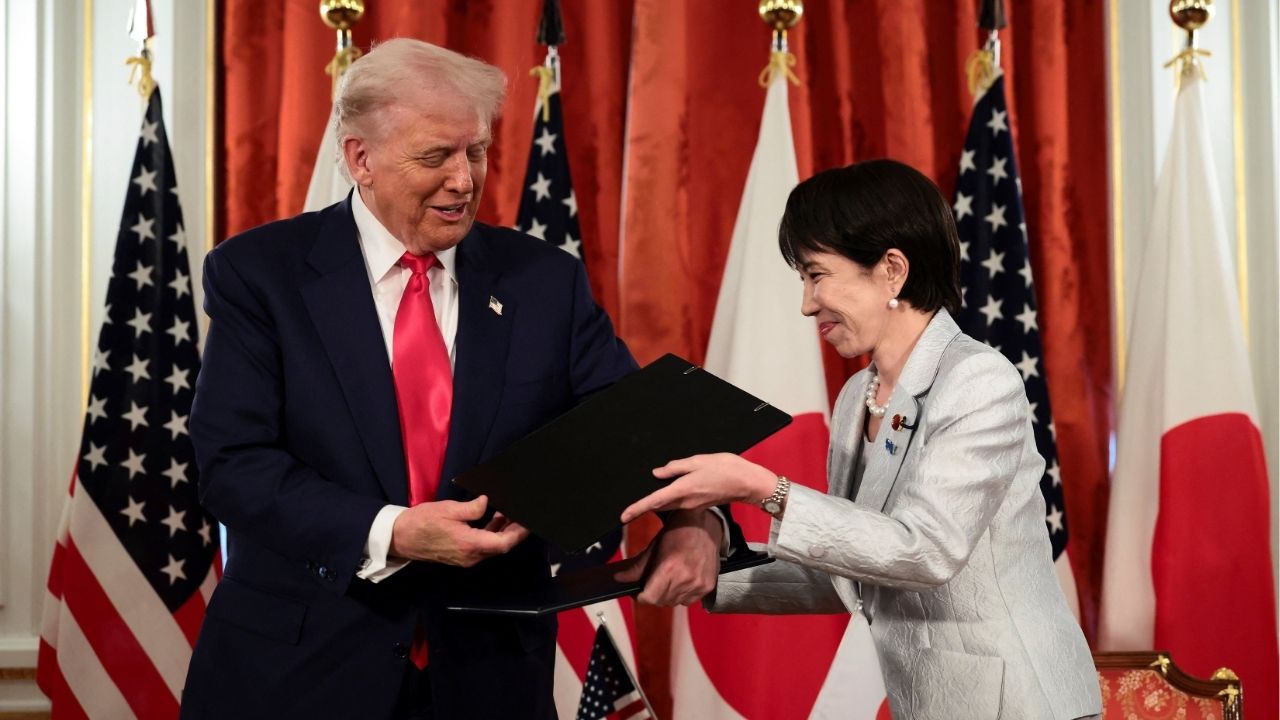 U.S. President Donald Trump and Japanese Prime Minister Sanae Takaichi hold signed documents regarding securing the supply of critical minerals and rare earths, at a bilateral meeting at Akasaka Palace in Tokyo, Japan, October 28, 2025. (Reuters/Evelyn Hockstein)