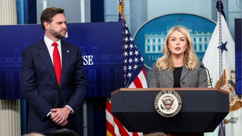 U.S. Vice President JD Vance listens as White House Press Secretary Karoline Leavitt speaks to reporters during a press briefing in Washington, D.C., U.S., October 1, 2025. (Reuters/Kevin Lamarque)