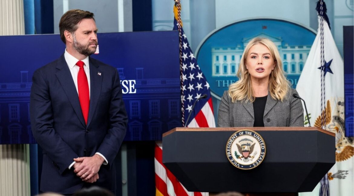 U.S. Vice President JD Vance listens as White House Press Secretary Karoline Leavitt speaks to reporters during a press briefing in Washington, D.C., U.S., October 1, 2025. (Reuters/Kevin Lamarque)
