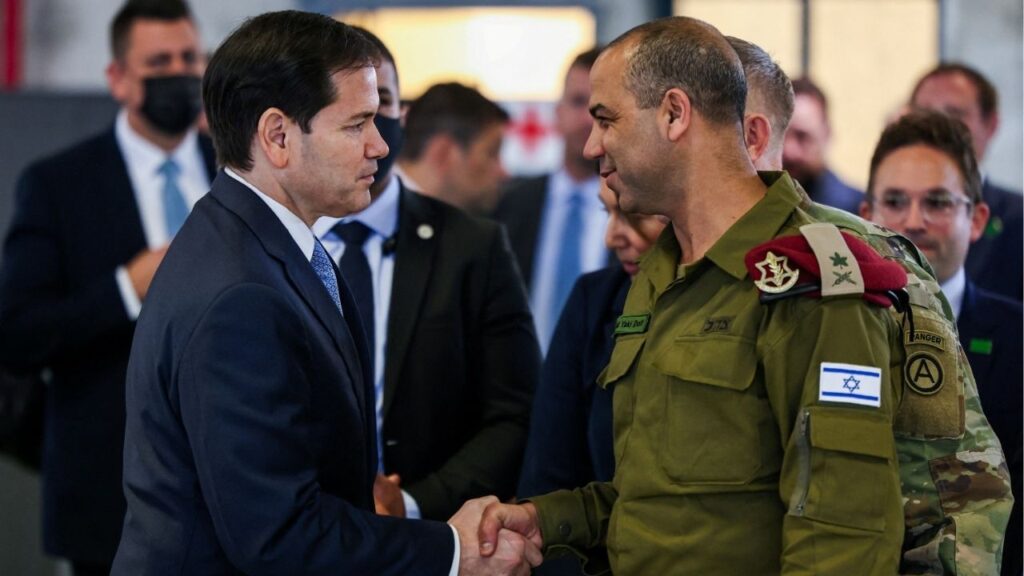 US Secretary of State Marco Rubio shakes hands with Israeli Brigadier General Yaakov Dolf as he visits the Civil-Military Coordination Center in southern Israel on October 24, 2025. (Fadel Senna/Pool via REUTERS)