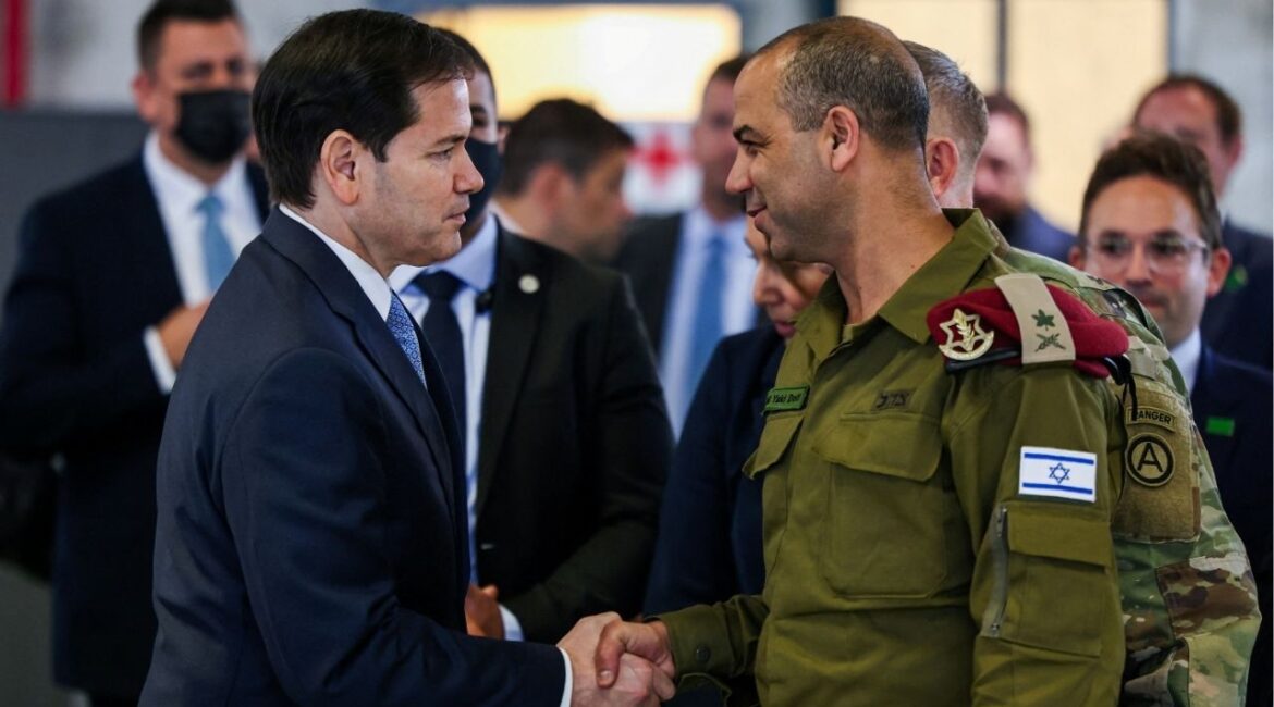 US Secretary of State Marco Rubio shakes hands with Israeli Brigadier General Yaakov Dolf as he visits the Civil-Military Coordination Center in southern Israel on October 24, 2025. (Fadel Senna/Pool via REUTERS)