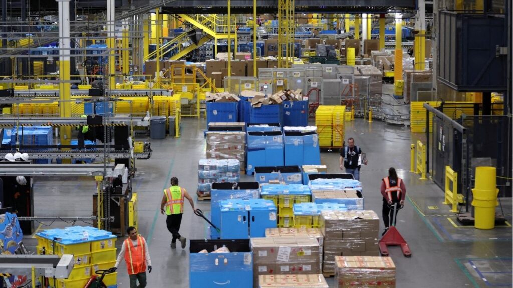Workers move products during Cyber Monday at the Amazon's fulfillment center in Robbinsville, New Jersey, U.S., November 27, 2023. (Reuters File)