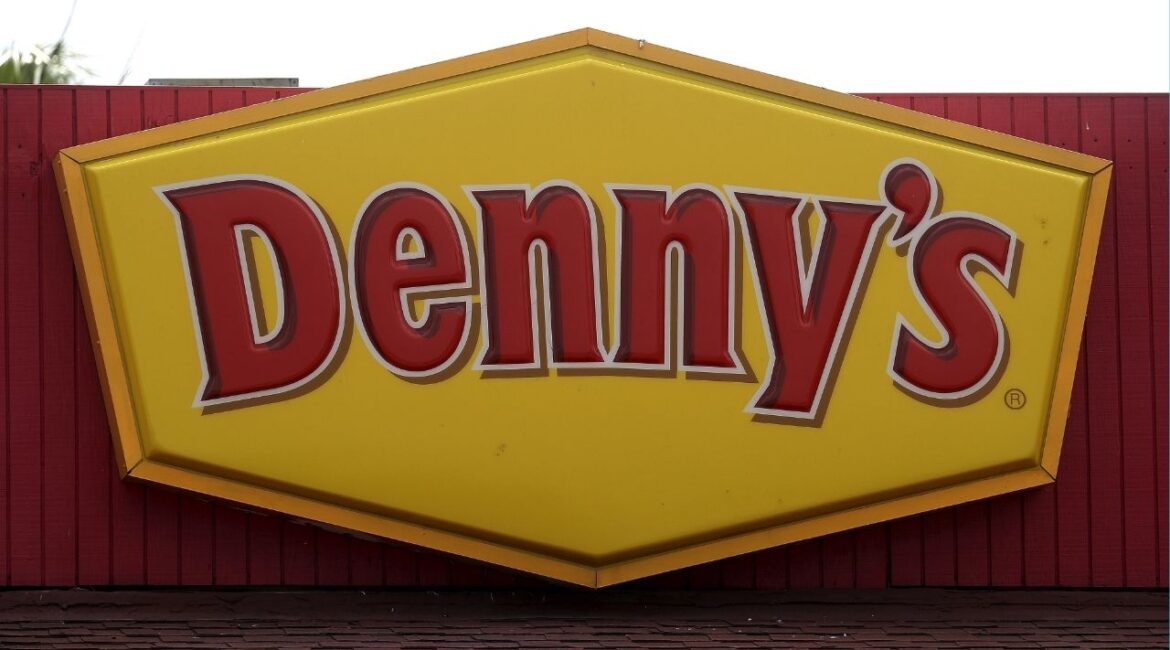 A Denny's restaurant logo is pictured on a building in North Miami, Florida March 19, 2016. (Reuters/Carlo Allegri)