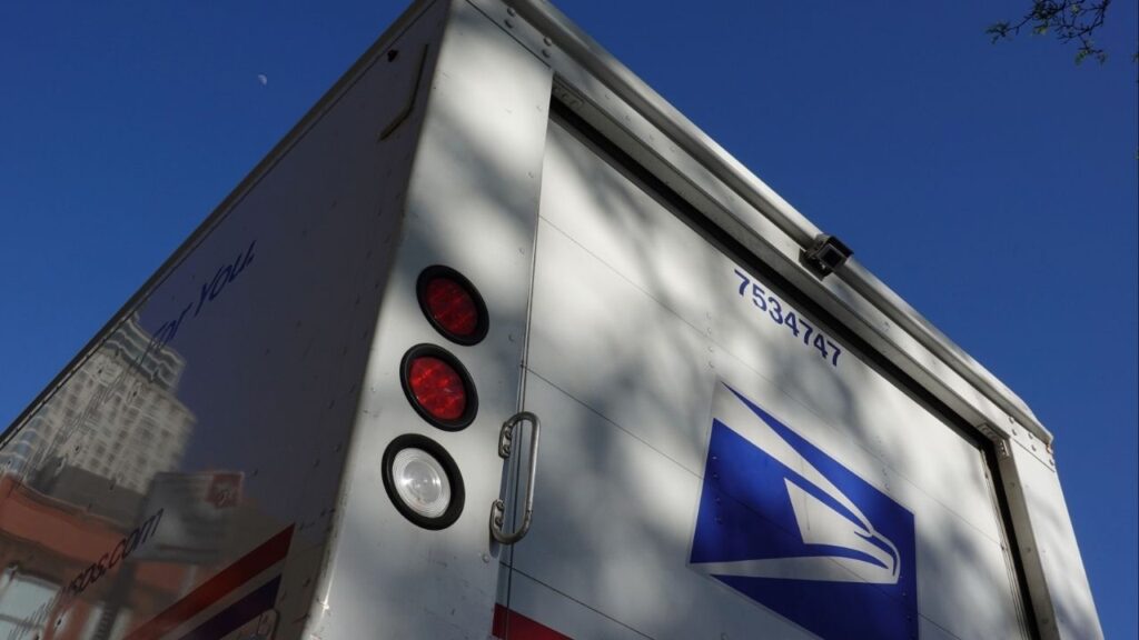 A United States Postal Service (USPS) mail delivery truck is seen in Queens, New York City, U.S., May 9, 2022. (Reuters/Andrew Kelly)
