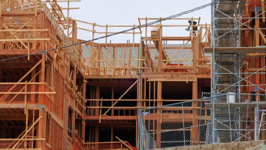 A construction worker works on a multi-unit residential housing building in Encinitas, California, U.S., October 6, 2025. (Reuters/Mike Blake)