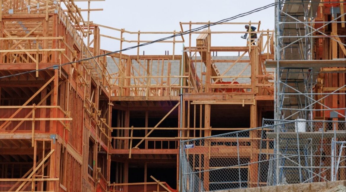 A construction worker works on a multi-unit residential housing building in Encinitas, California, U.S., October 6, 2025. (Reuters/Mike Blake)