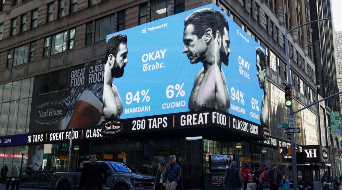 A display shows an advertisement for betting on the New York City mayoral election, featuring Democratic candidate for New York City mayor Zohran Mamdani and Independent candidate for New York City mayor and former New York Governor Andrew Cuomo, in Times Square, in New York City, U.S., November 4, 2025. (Reuters/Kylie Cooper)