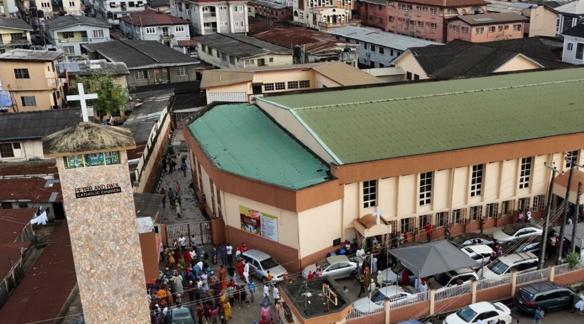 A drone view of Christians departing St. Peter and Paul Catholic Church after a Sunday mass in Palmgrove, Lagos, Nigeria November 2, 2025. (Reuters/Sodiq Adelakun)